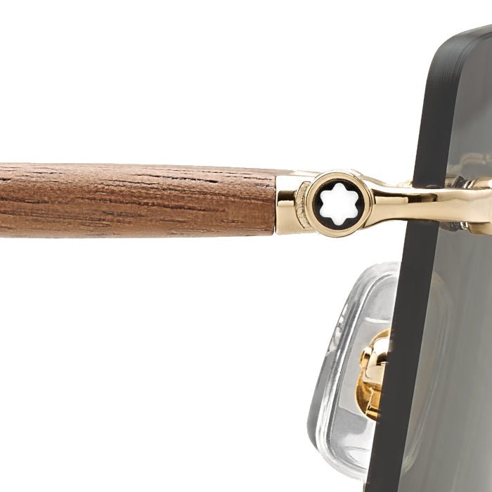 Lunettes de soleilMontblancLunettes de soleil Montblanc carrées à monture métallique dorée